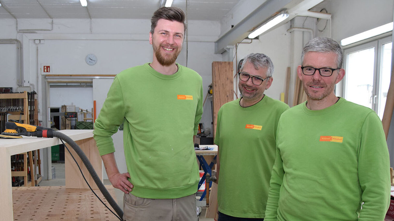 Daniel Jungbluth, Mike Kutzner und Martin Ritzdorf in der Werkstatt